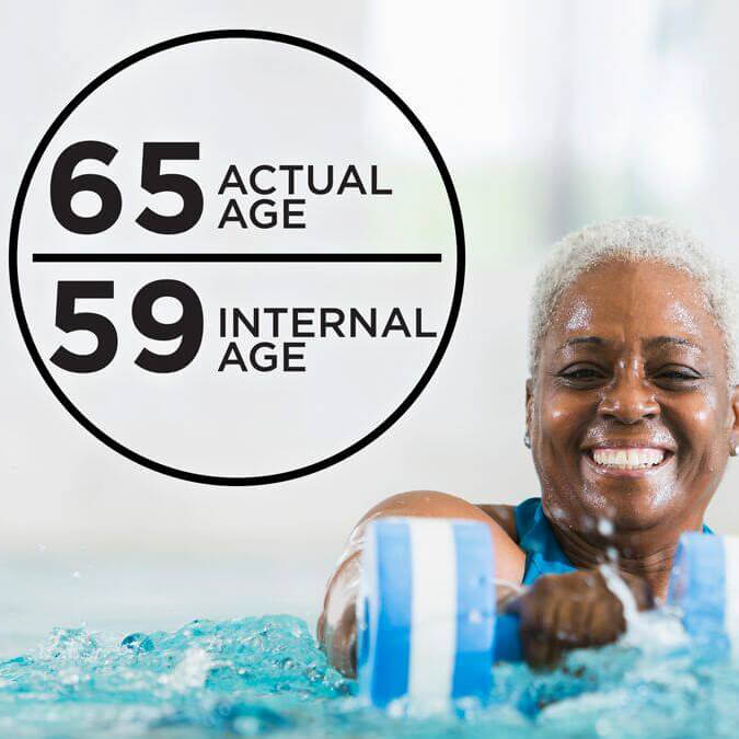Swimmer woman showing vitals of actual and internal age