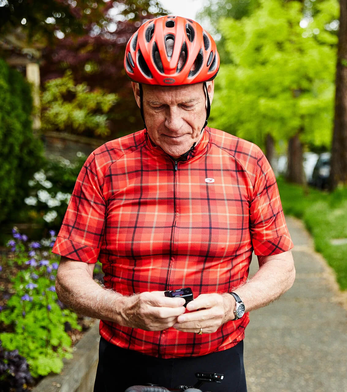 Senior biker using iHeart device