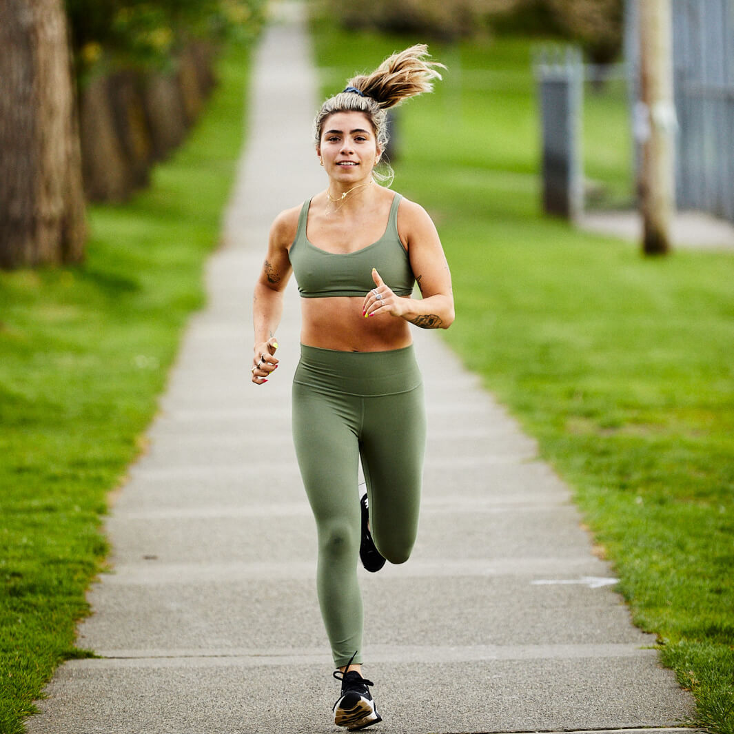 Running woman towards the camera